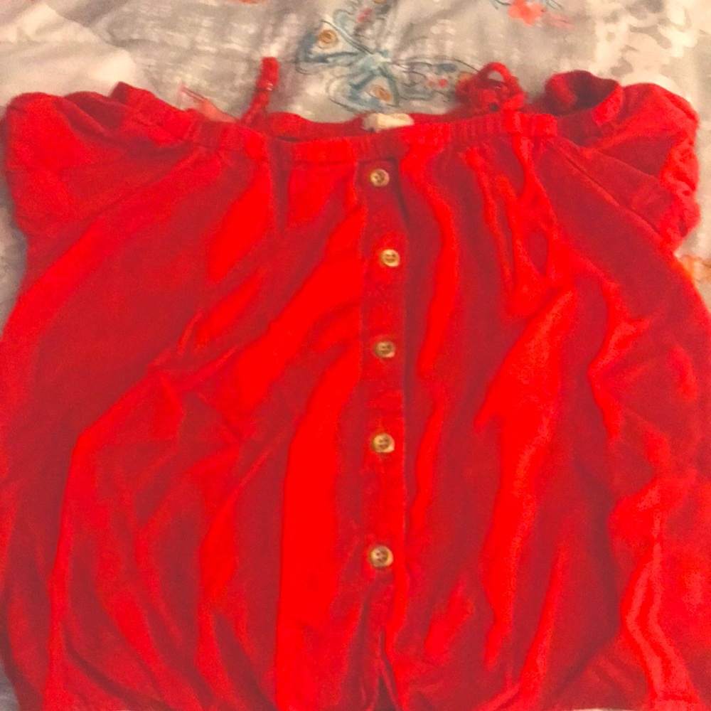 A red shirt that is good for summer.